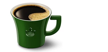 Grüne Jacobs Kaffeetasse mit Kaffee
